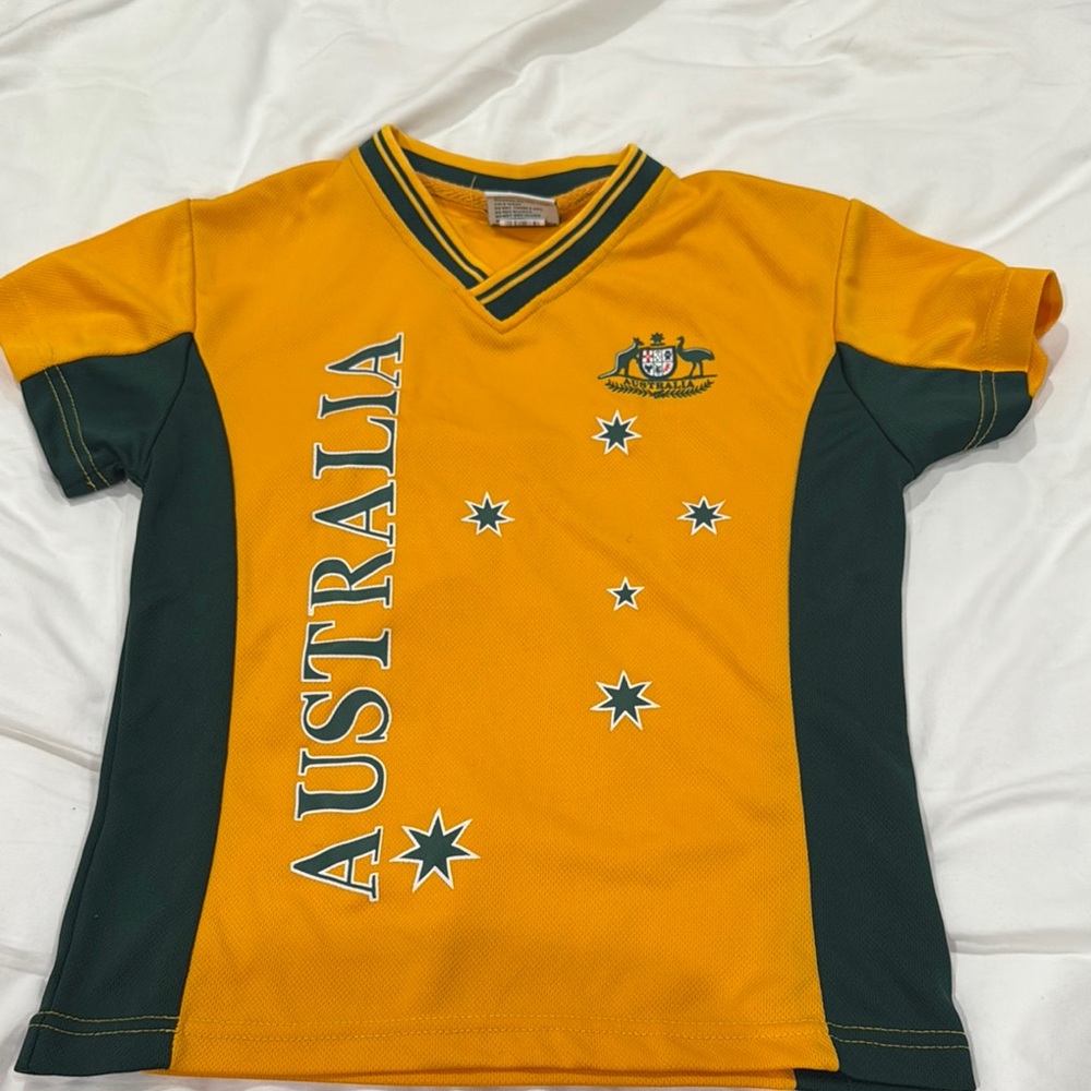 Australia  shirt size 12 fits like boys 6/8